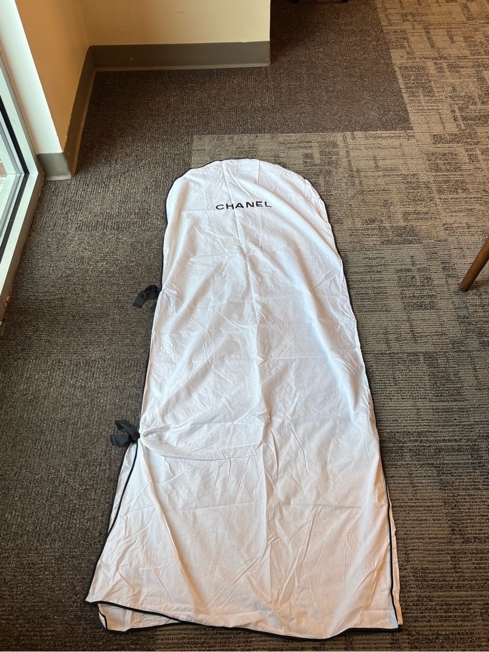 CHANEL White Garment Cover with Black Trim